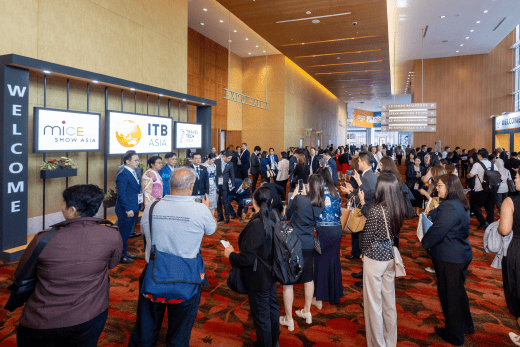 A busy scene at ITB Asia 2026 showcasing Asia's leading travel trade event in Singapore, with attendees networking and exploring.