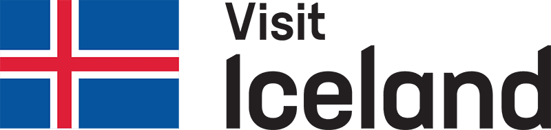 Vibrant ITB Asia 2026 trade show banners at Singapore Expo with global travel industry attendees.