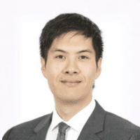 Professional male speaker at ITB Asia 2026 travel trade event in Singapore.