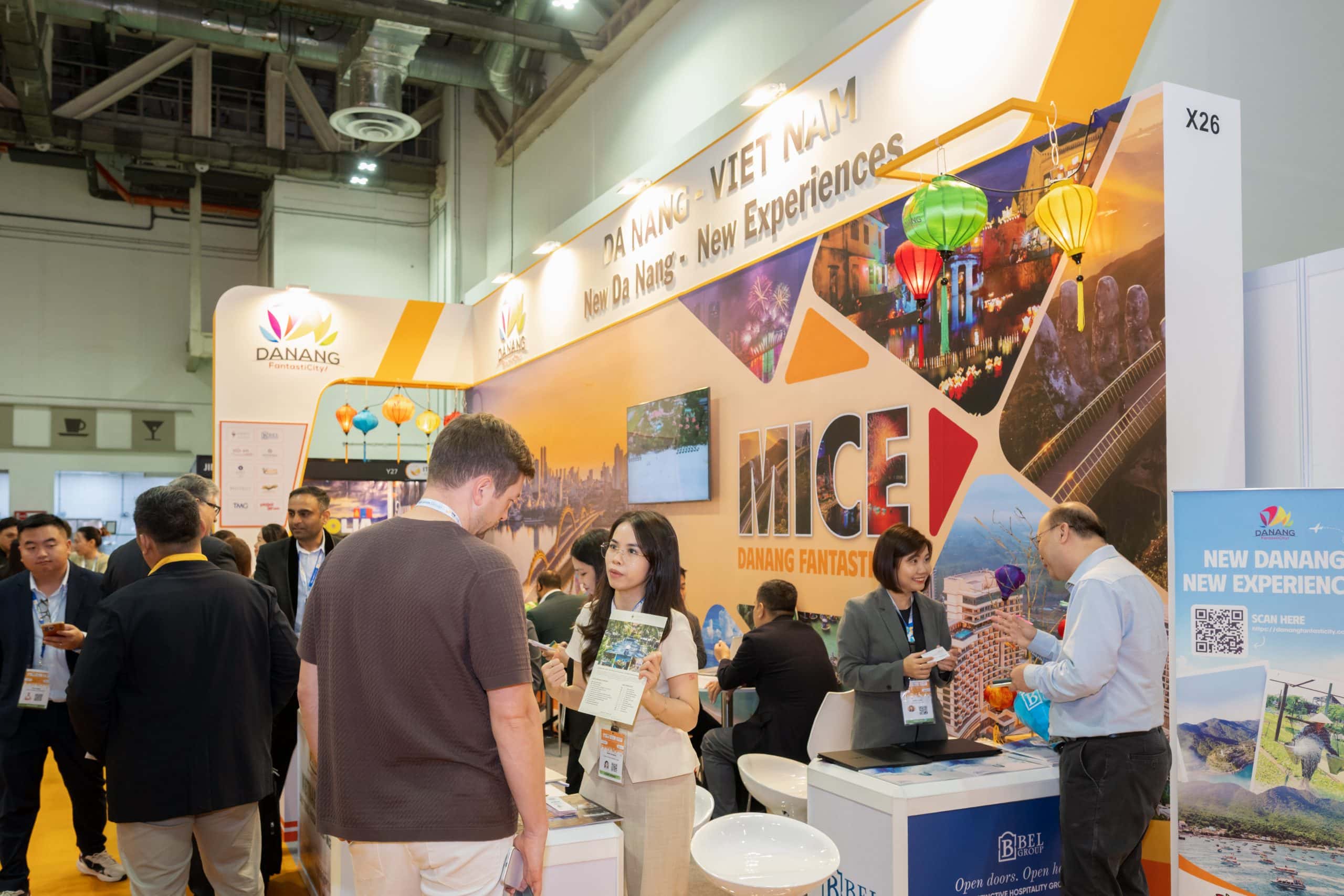 ITB Asia 2026 travel trade show booth in Singapore with visitors and representatives.