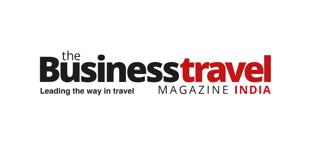 The Business Travel Magazine India logo featuring bold black and red text.