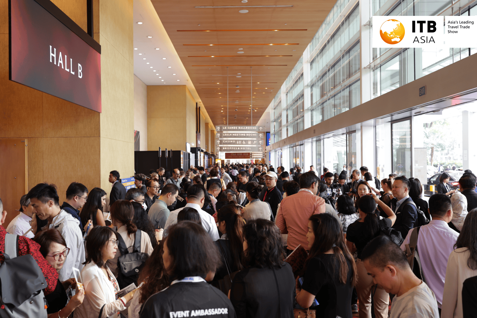 Large crowd of attendees at ITB Asia 2026 in Singapore, bustling hall and signage.
