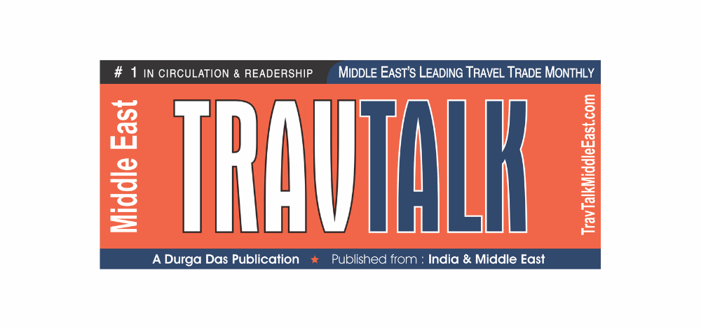 Middle East travel magazine cover with TRAVELTALK logo and headlines.